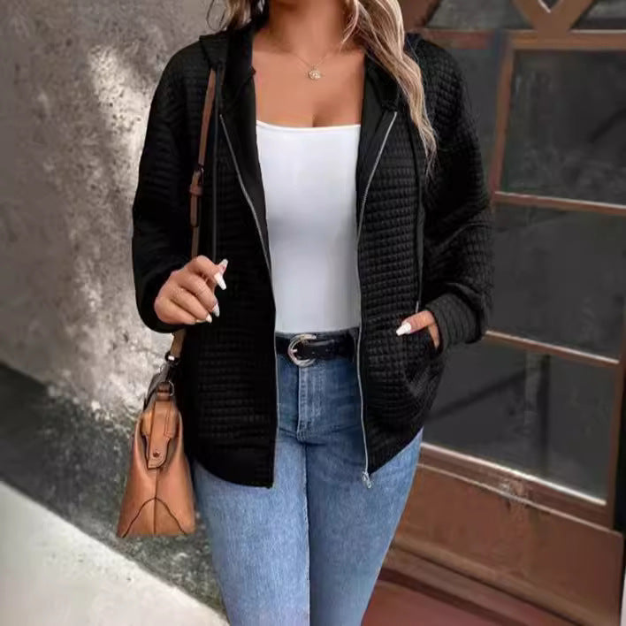 Women's loose-fitting hooded jacket with a textured waffle surface and practical pockets, size S