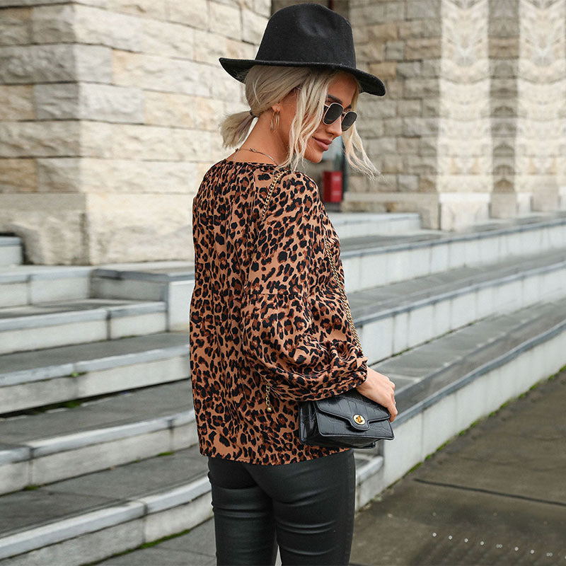 Women's blouse with unique leopard print and voluminous sleeves, size [size missing]