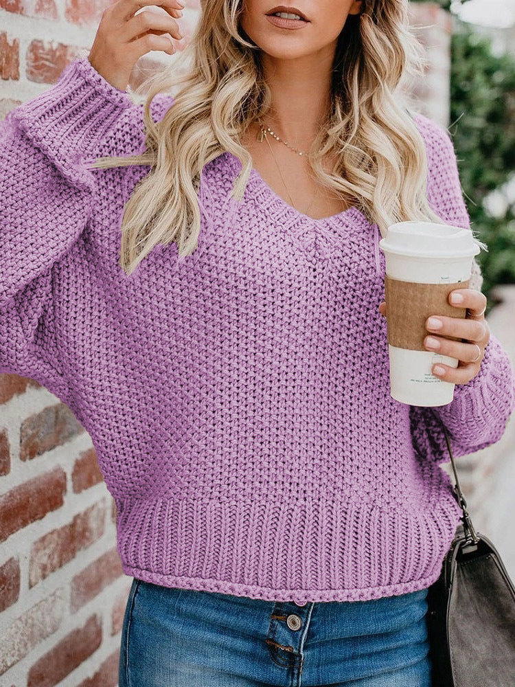 Women's chunky knit sweater with deep V-neck and relaxed fit, size