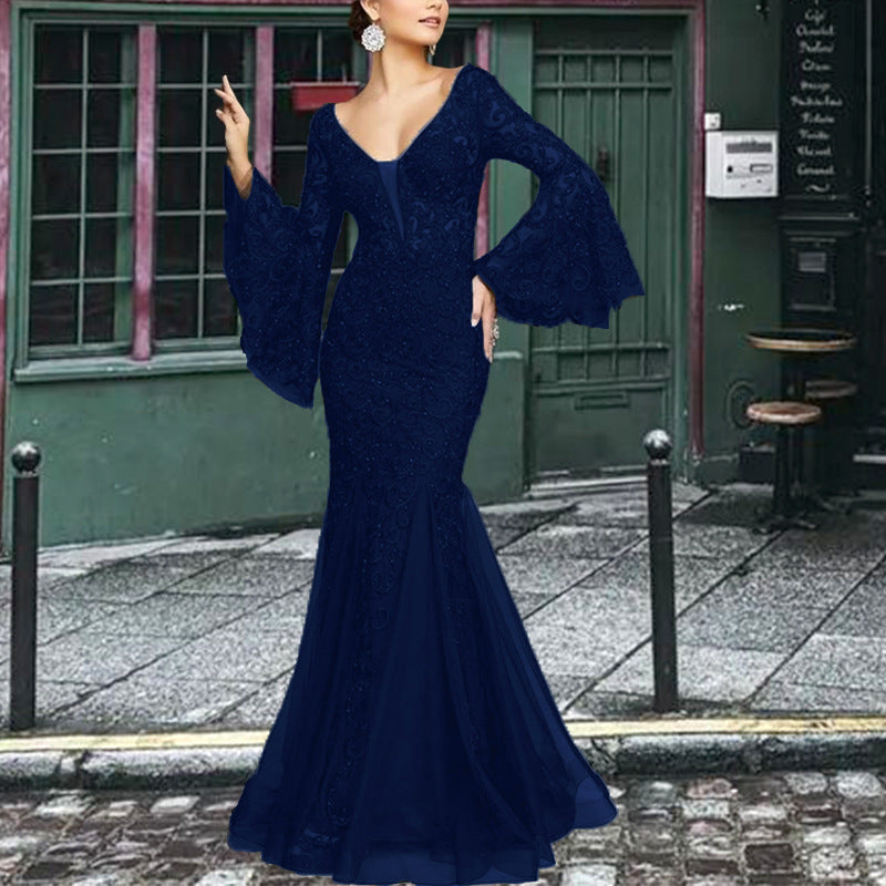Women's figure-hugging evening dress with shimmering embellishments and elegant V-neck, size S