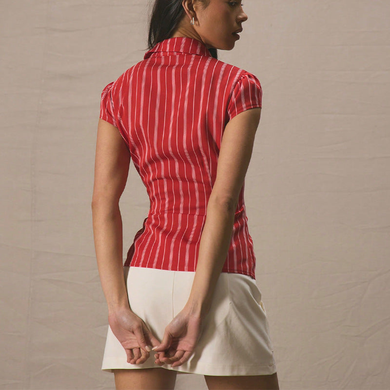 Women's short-sleeved blouse with fine stripes and a modern cut, size [size missing]