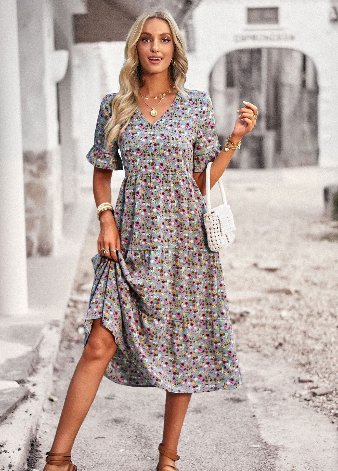 Women's midi dress with floral pattern and playful V-neck, size