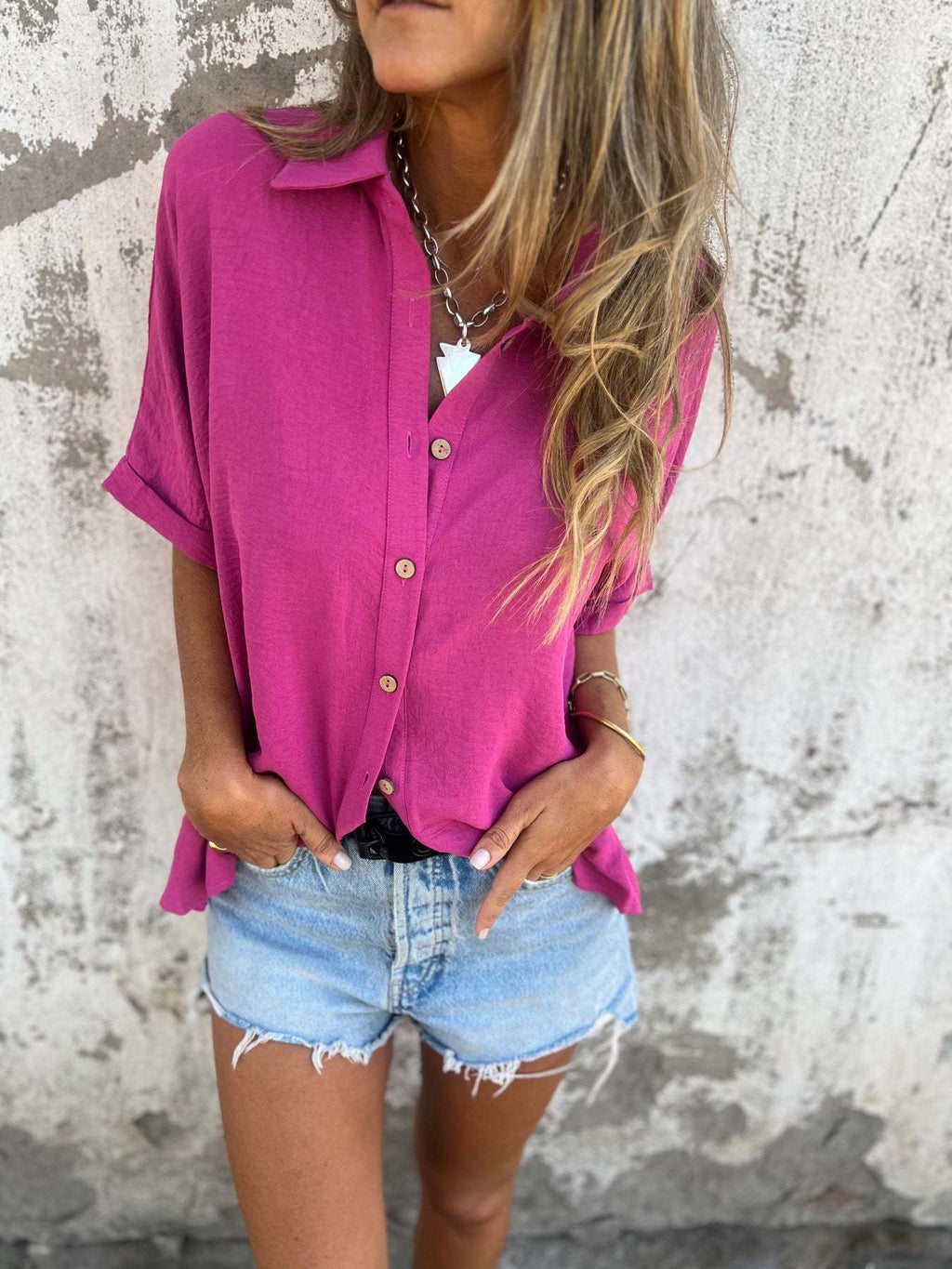 Women's fashionable blouse with full button closure and casual cut