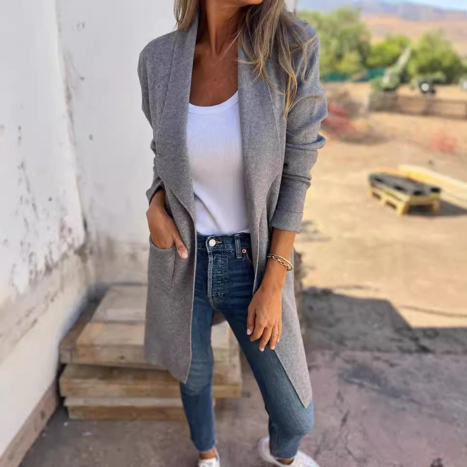 Women's casual long jacket with a modern cut and elegant details, size S