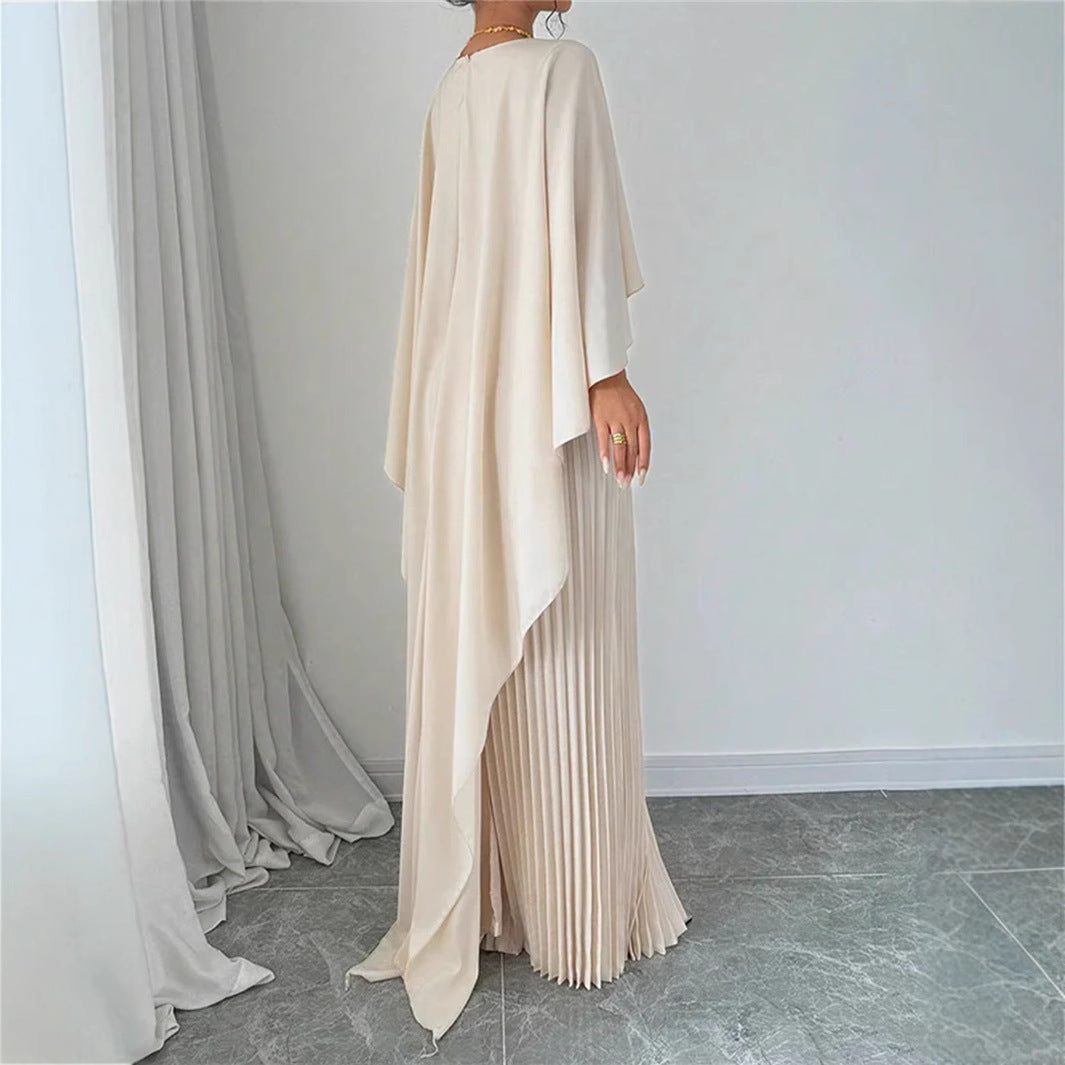 Valenzora | Elegant long dress with batwing sleeves, pleated asymmetrical design, and flowing fit
