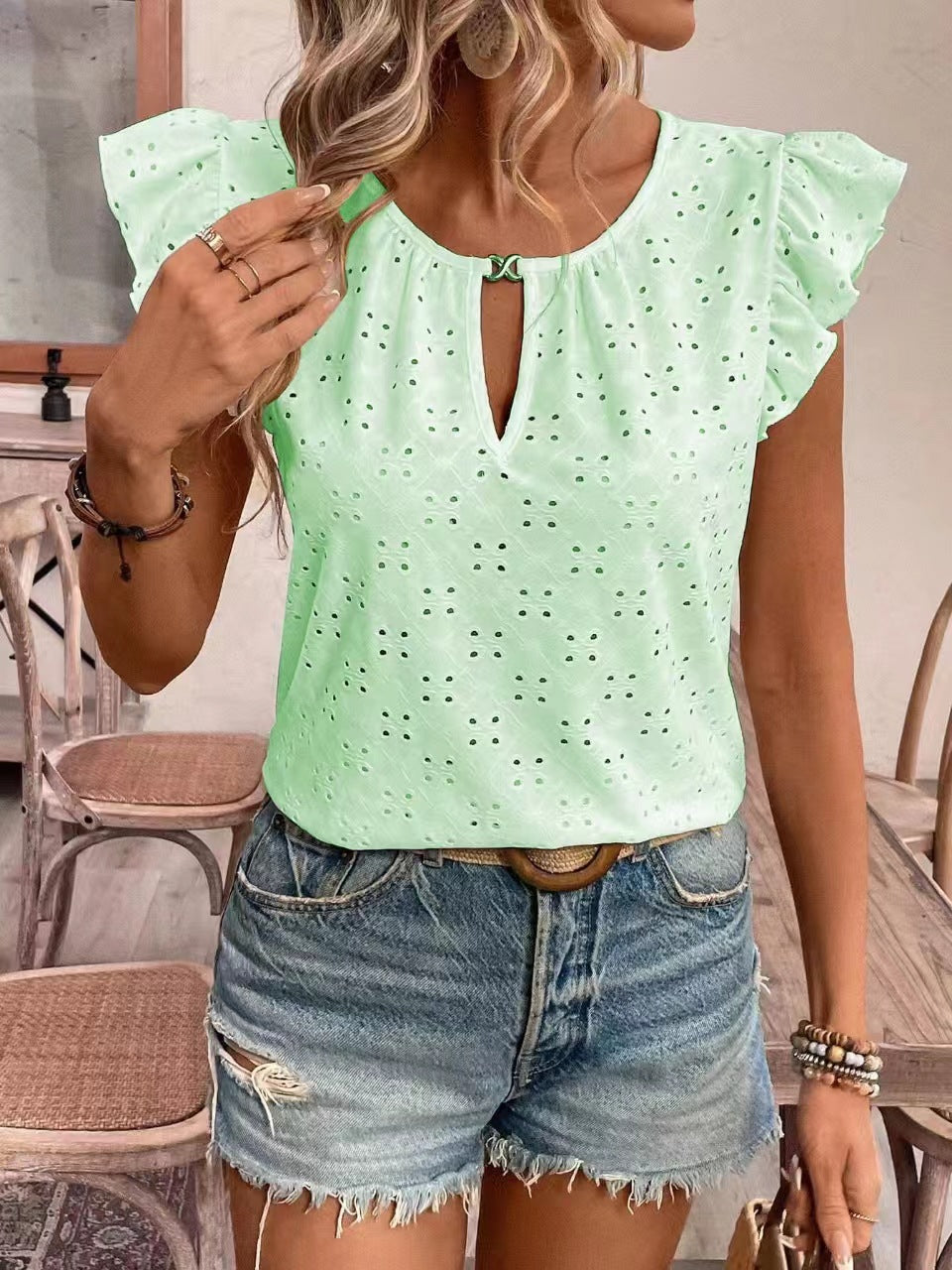 Women's blouse with ruffle details and eyelet embroidery, size