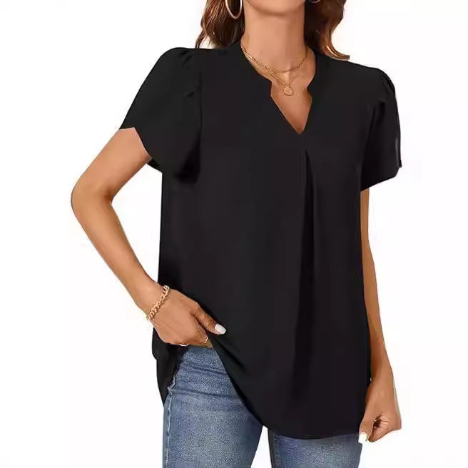 Women's blouse with elegant V-neck detail and light puff sleeves, size [size]
