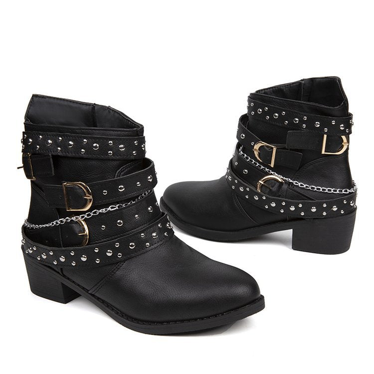 Women's ankle boots with a fashionable strap design and decorative accents, size S
