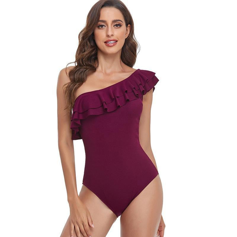 Damen-Badeanzug mit asymmetrischem Schnitt und voluminösem Rüschendetail, Größe [size]