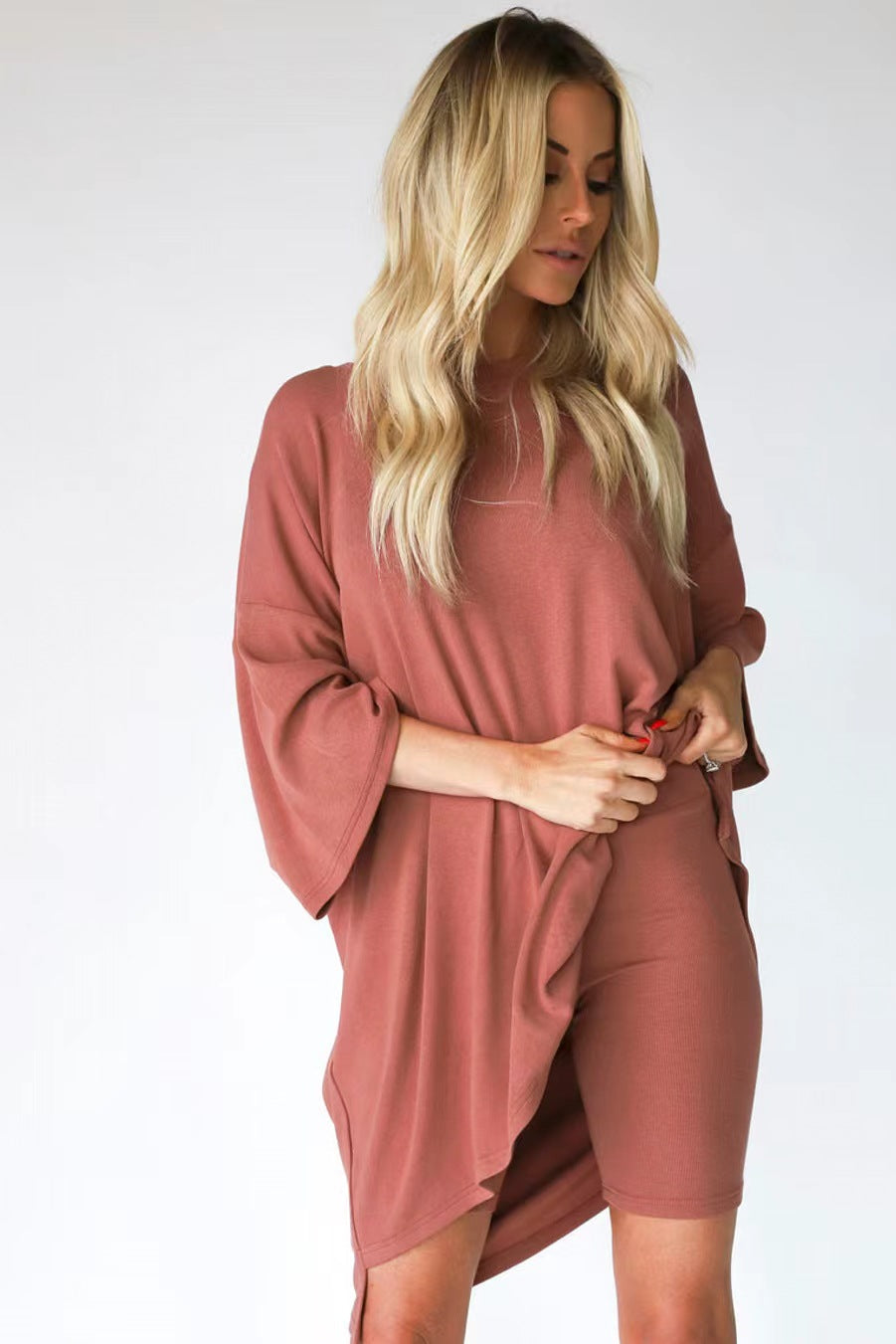 Women's comfortable oversized blouse with deep V-neck, size