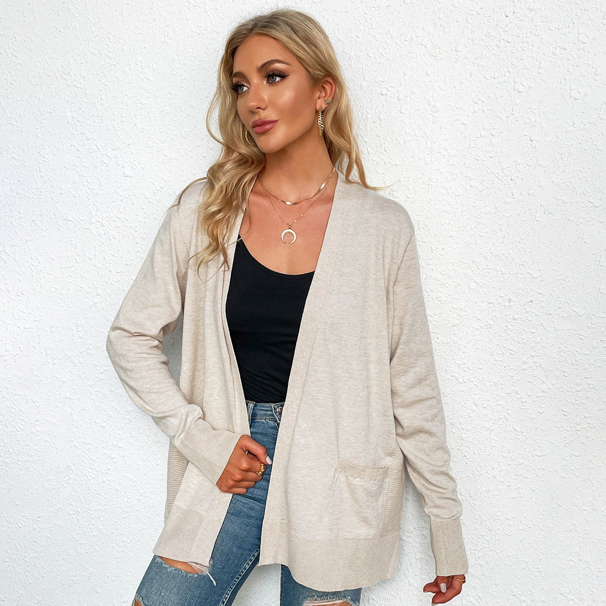Women's casual knit cardigan with deep V-neck and practical pockets, size S