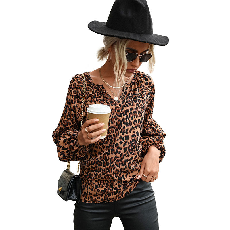 Women's blouse with unique leopard print and voluminous sleeves, size [size missing]