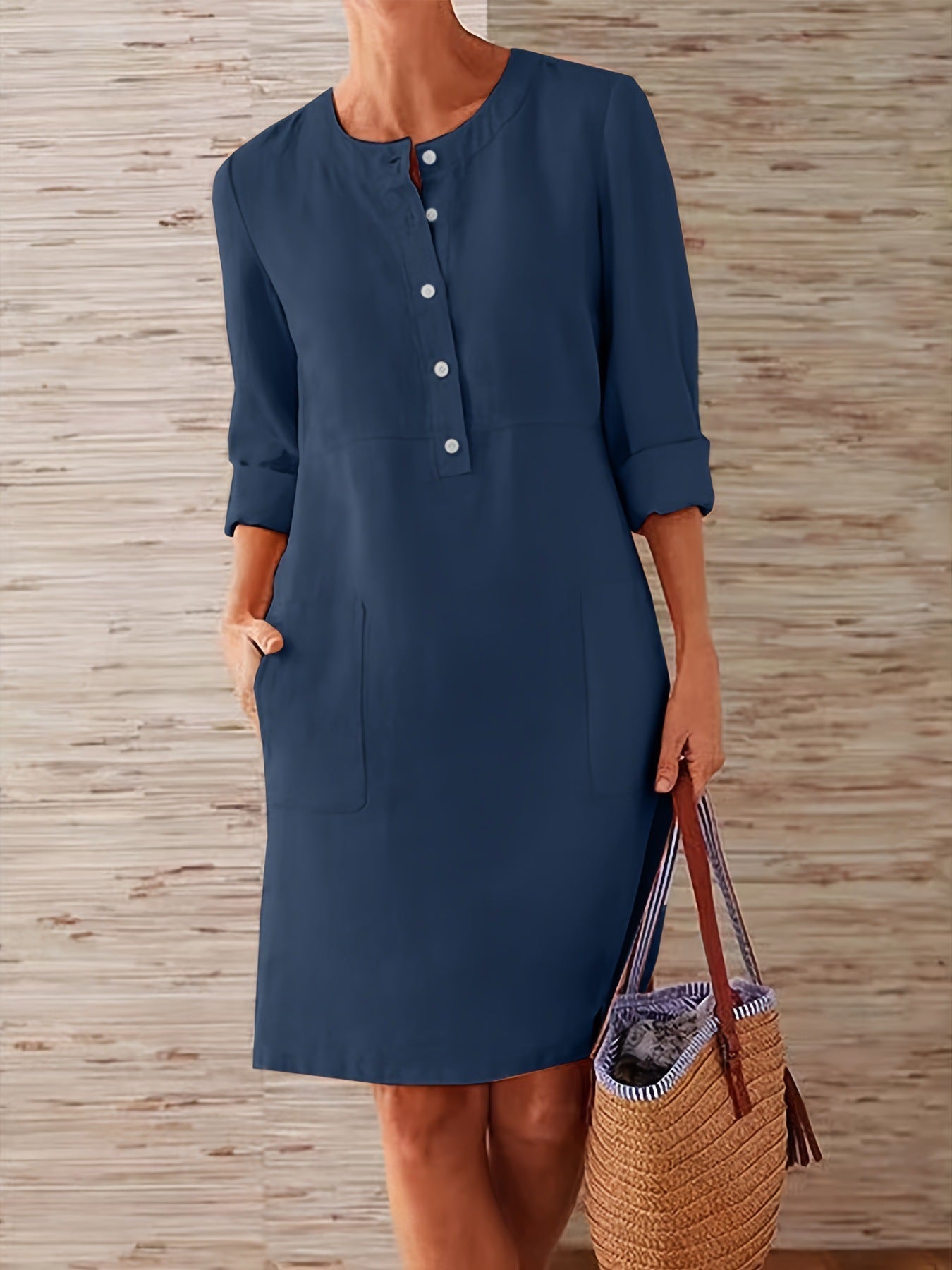 Women's versatile dress with button placket and practical pockets, size