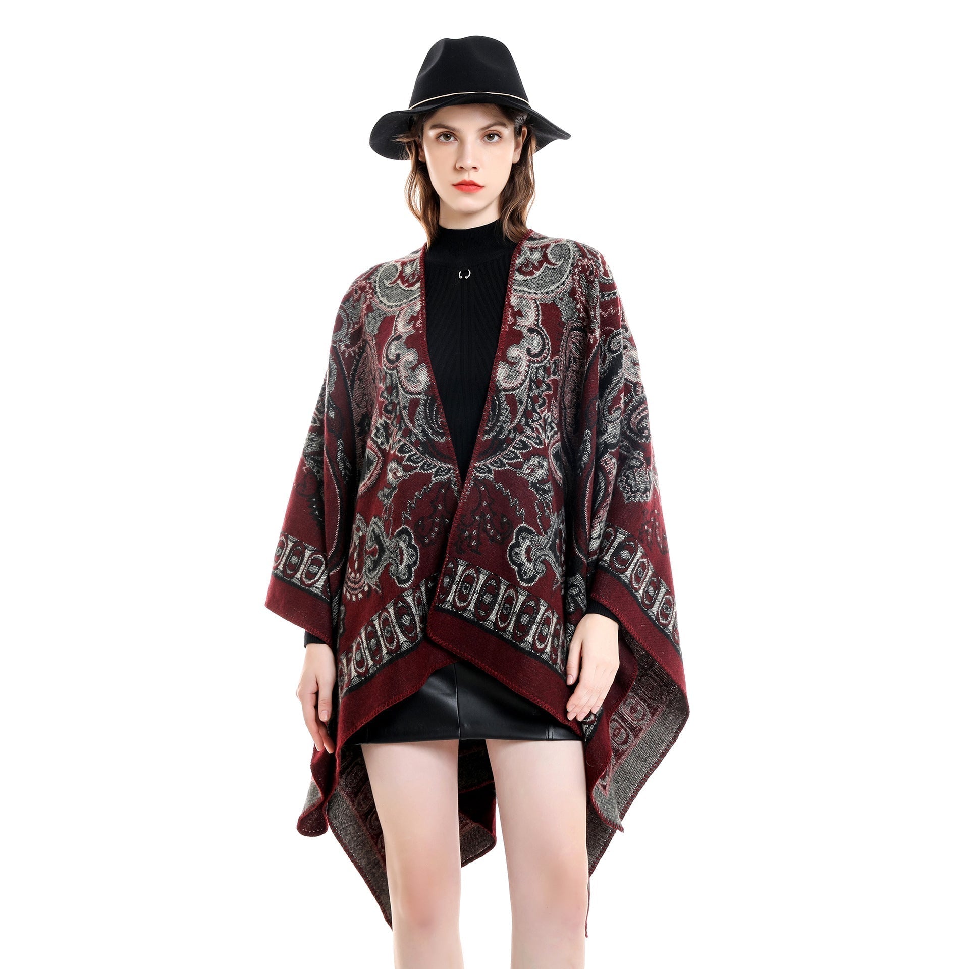 Women's elegant poncho with an artistic floral pattern and luxurious feel (size not specified)