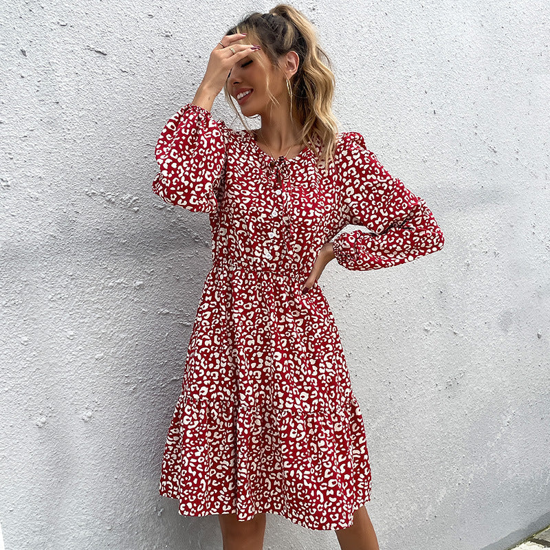 Women's midi dress with floral animal print and elegant button placket, size