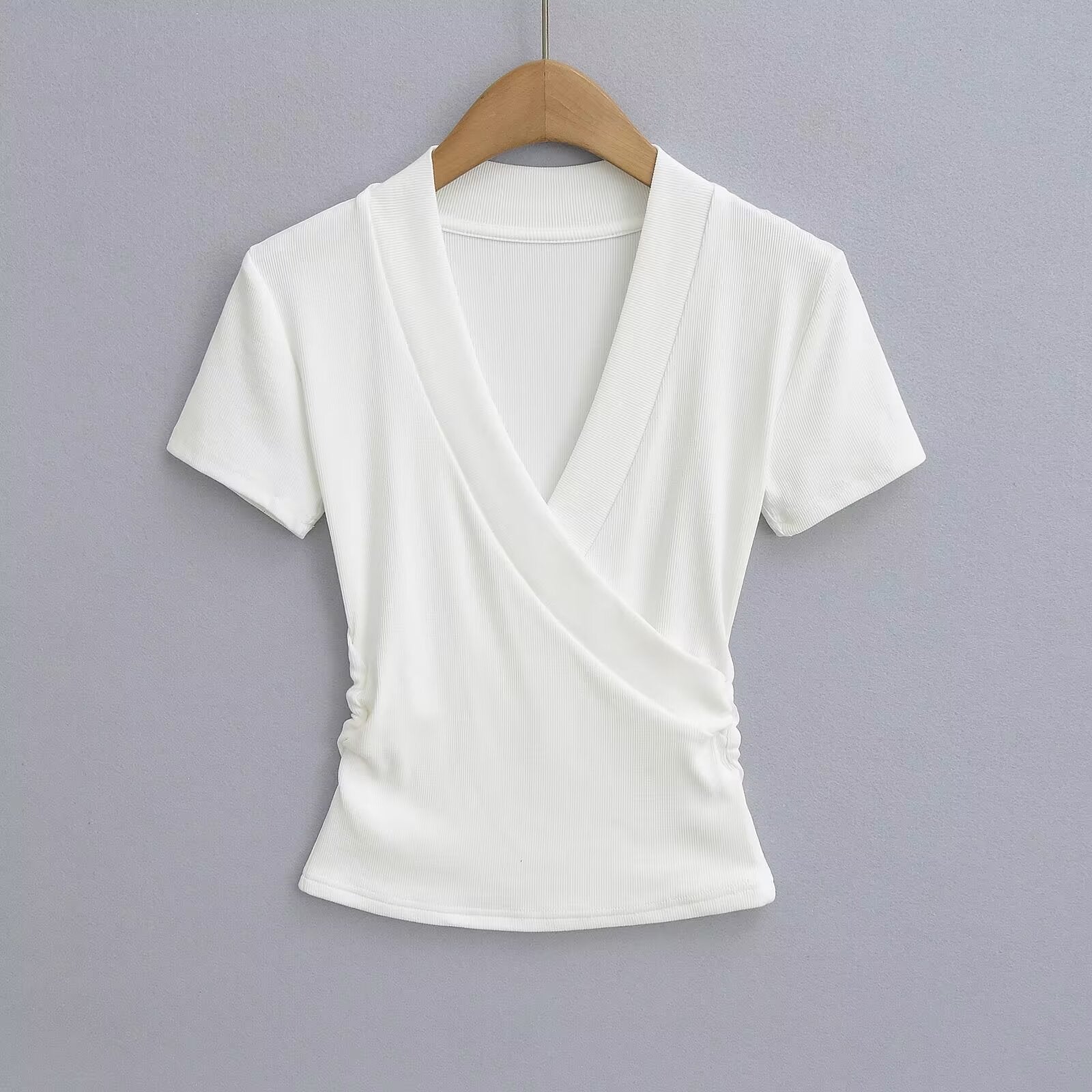 Women's wrap top with elegant V-neck and figure-flattering cut, size