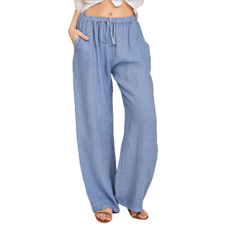 Women's wide linen trousers with elasticated waistband and practical pockets, size