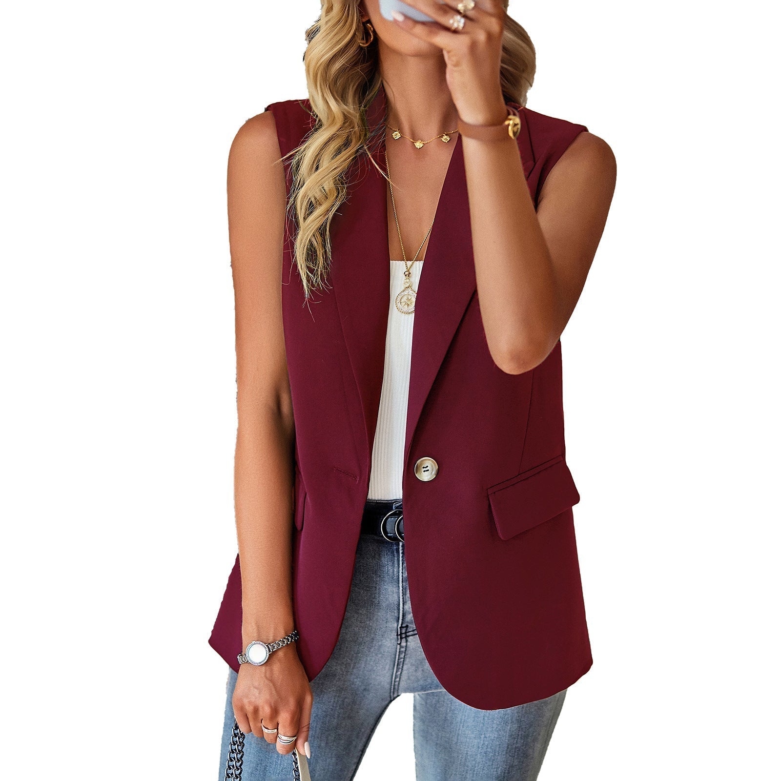 Women's casual sleeveless blazer with a tailored cut and elegant pockets, size S