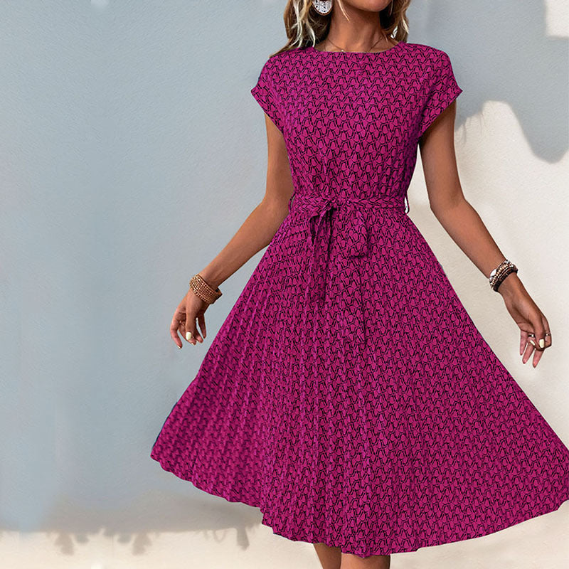 Women's midi dress with a sophisticated waist belt and playful pattern, size