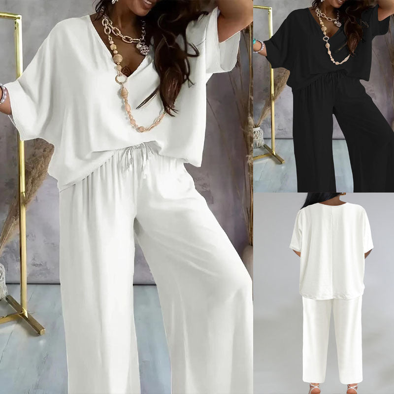 Women's elegant jumpsuit with V-neck and wide leg, size