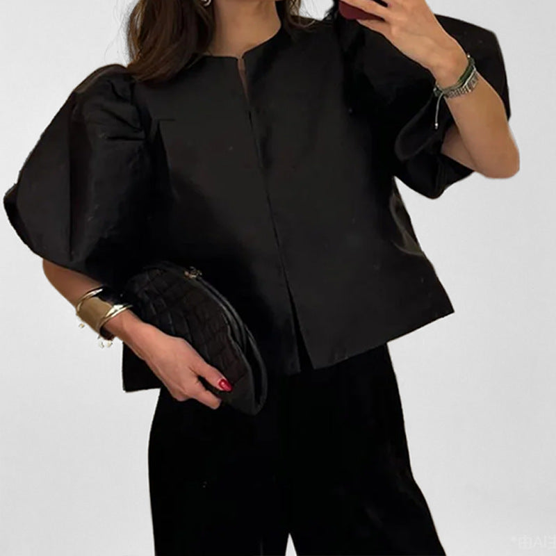 Damenbluse mit voluminösen Puffärmeln und modernem Design, Größe S