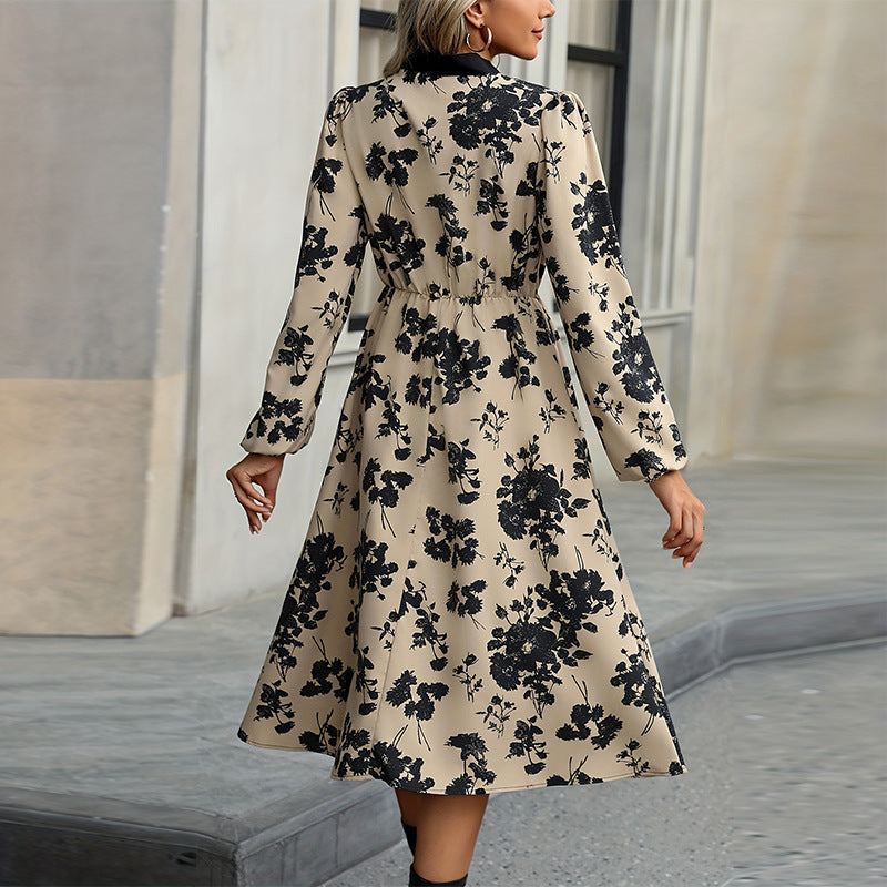 Elegantes Damen-Midikleid mit Blumenmuster und Schleifendetails, Größe