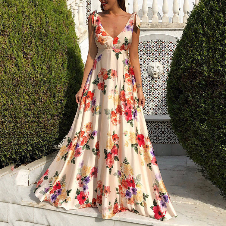 Valenzora | Printed long-sleeved spaghetti strap dress with a wide hem