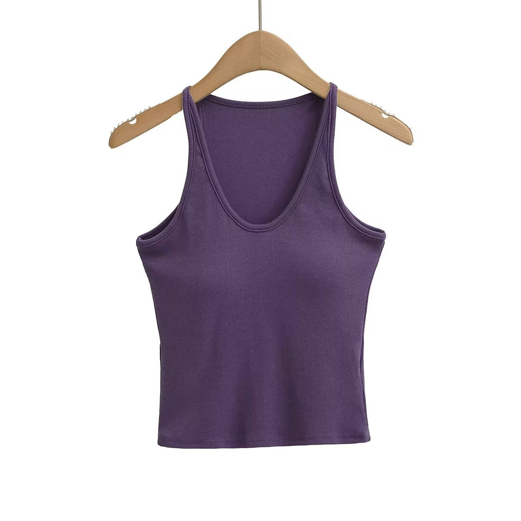 Women's sleeveless sports top with deep U-neck and elastic material, size S