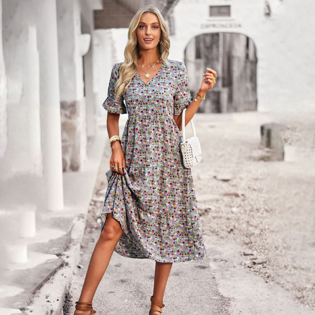 Women's midi dress with floral pattern and playful V-neck, size