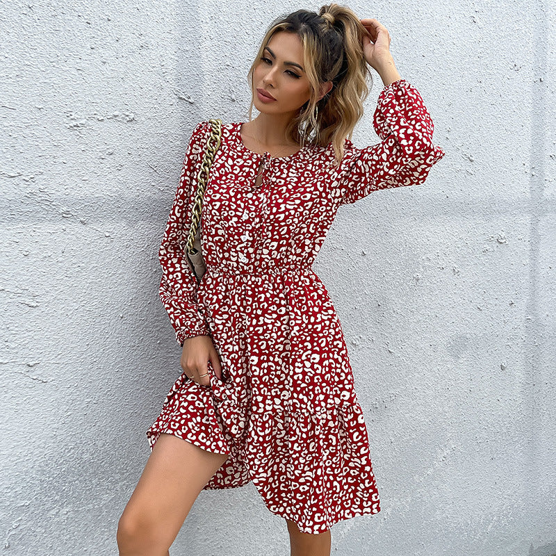 Women's midi dress with floral animal print and elegant button placket, size