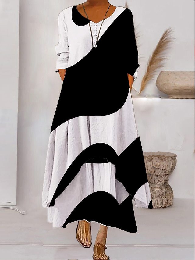 Valenzora | Maxi dress with long sleeves and button closure