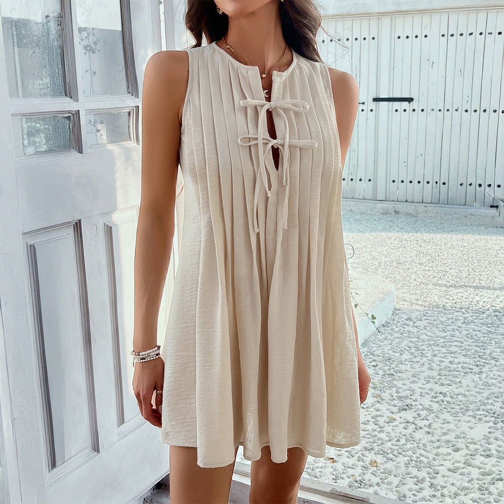 Women's short sleeveless dress with ruching and decorative keyhole neckline, size S