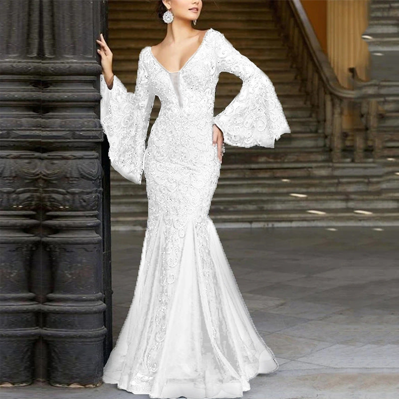 Women's figure-hugging evening dress with shimmering embellishments and elegant V-neck, size S