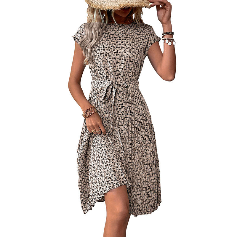 Women's midi dress with a sophisticated waist belt and playful pattern, size