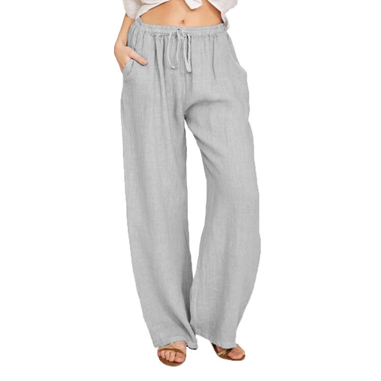 Women's wide linen trousers with elasticated waistband and practical pockets, size