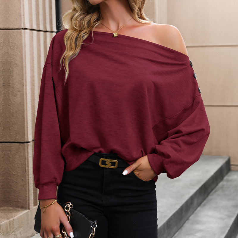 Women's casual one-shoulder pullover with striking button details, size