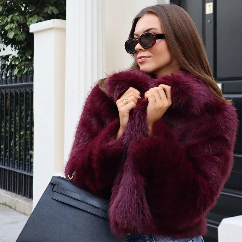Women's faux fur jacket with a voluminous collar and elegant cut, size S