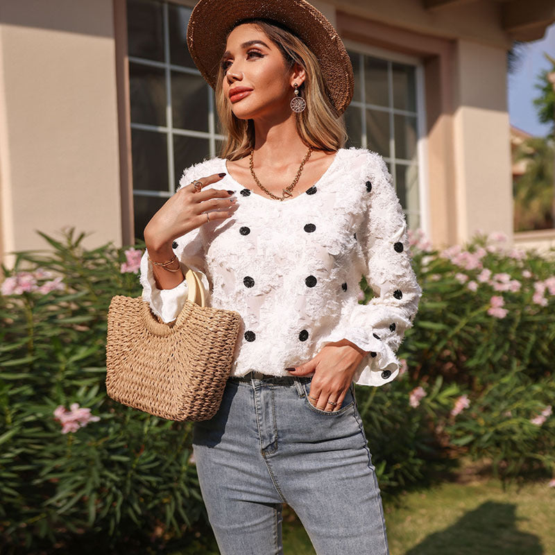 Women's blouse with decorative ruffle details and feminine lace texture, size