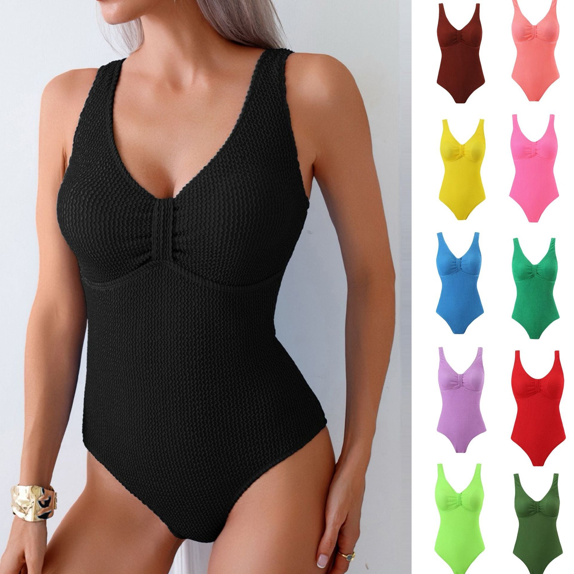 Women's one-piece swimsuit with textured outer material and sporty cut, size S