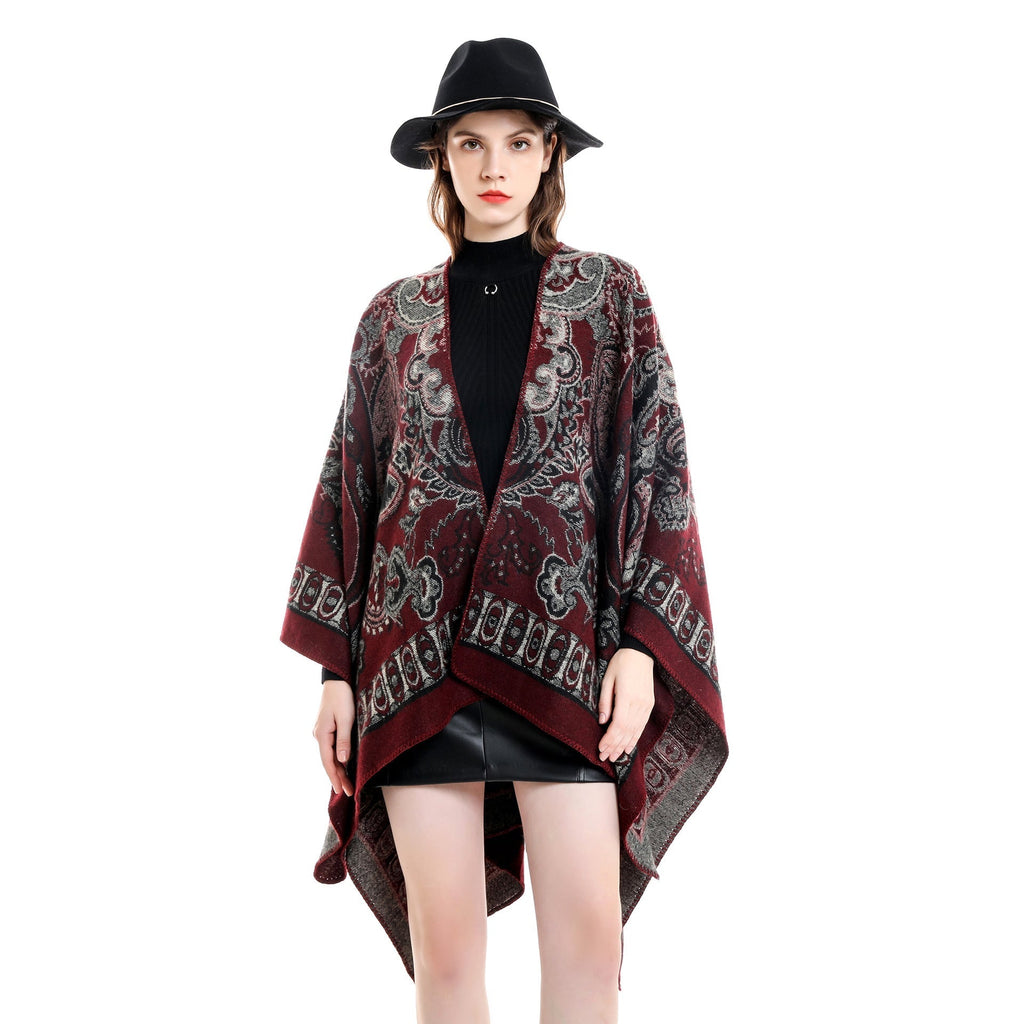 Women's elegant poncho with an artistic floral pattern and luxurious feel (size not specified)