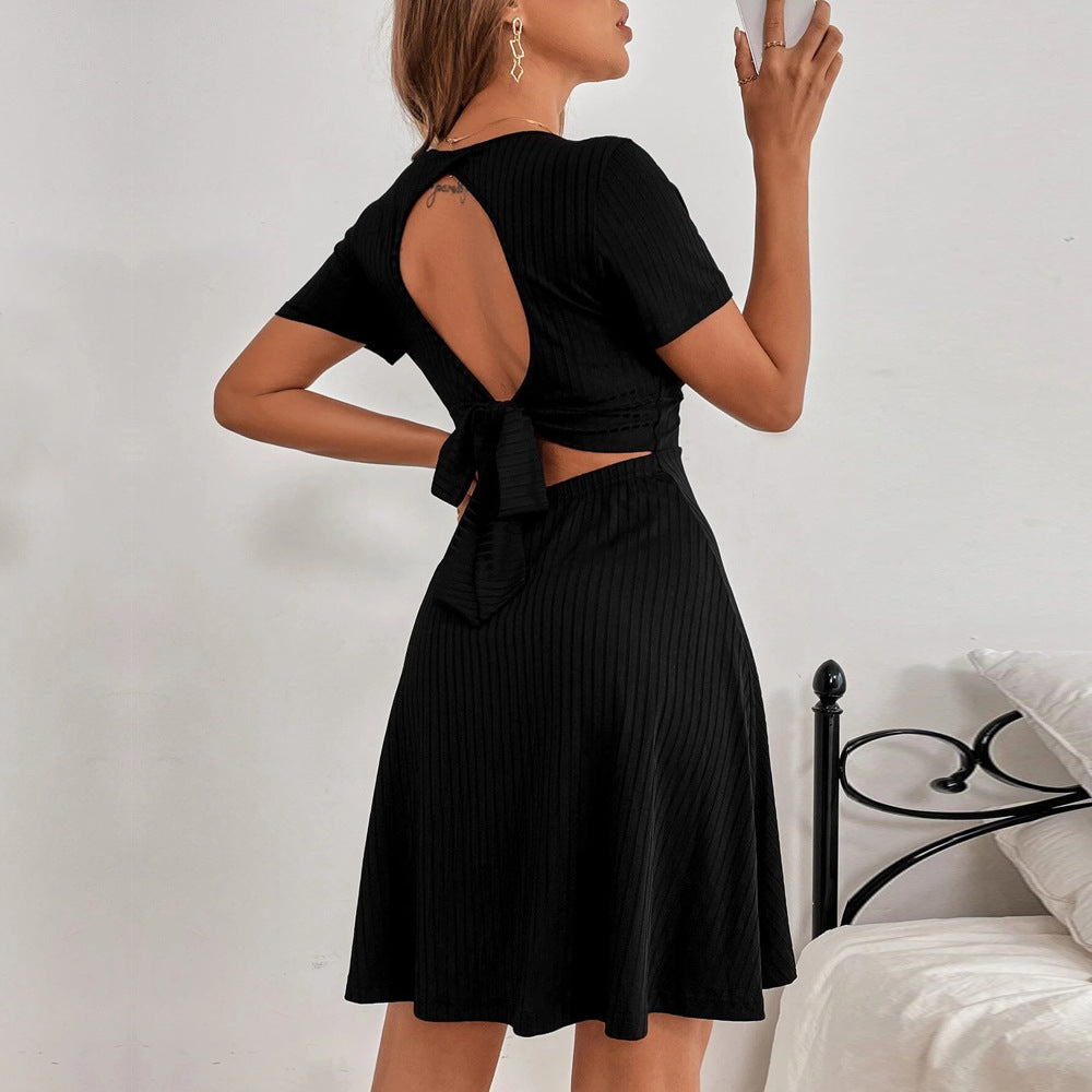 Women's dress with open back and casual tie belt, size