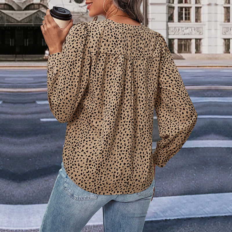 Women's blouse with modern polka dot design and elegant ruffles, size [size missing]