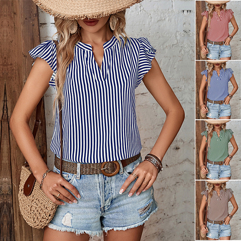 Women's blouse with ruffle details and striped pattern, size