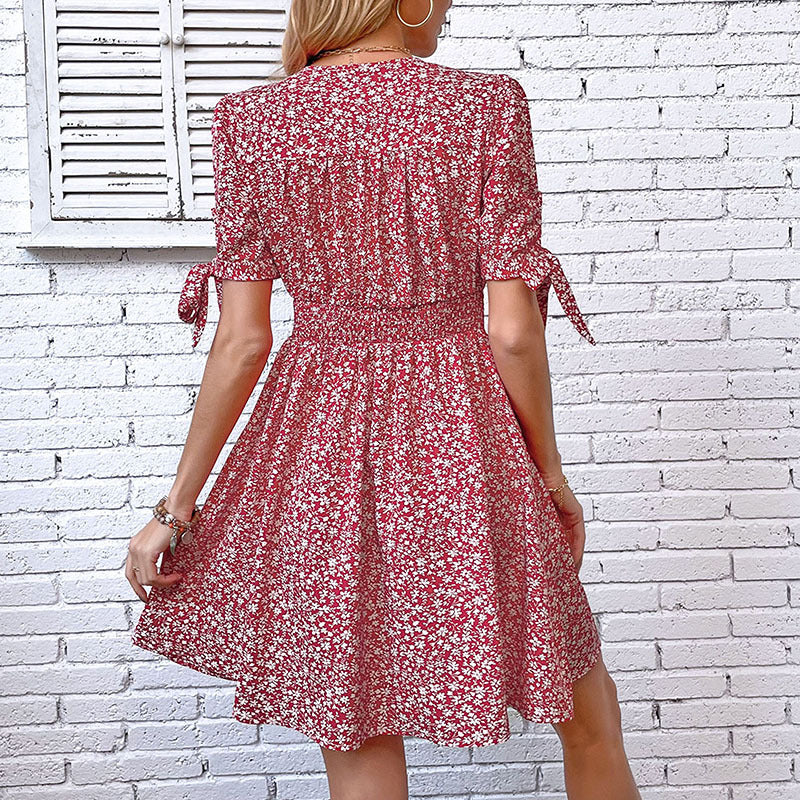 Women's blouse dress with floral patterns and playful ruffles, size