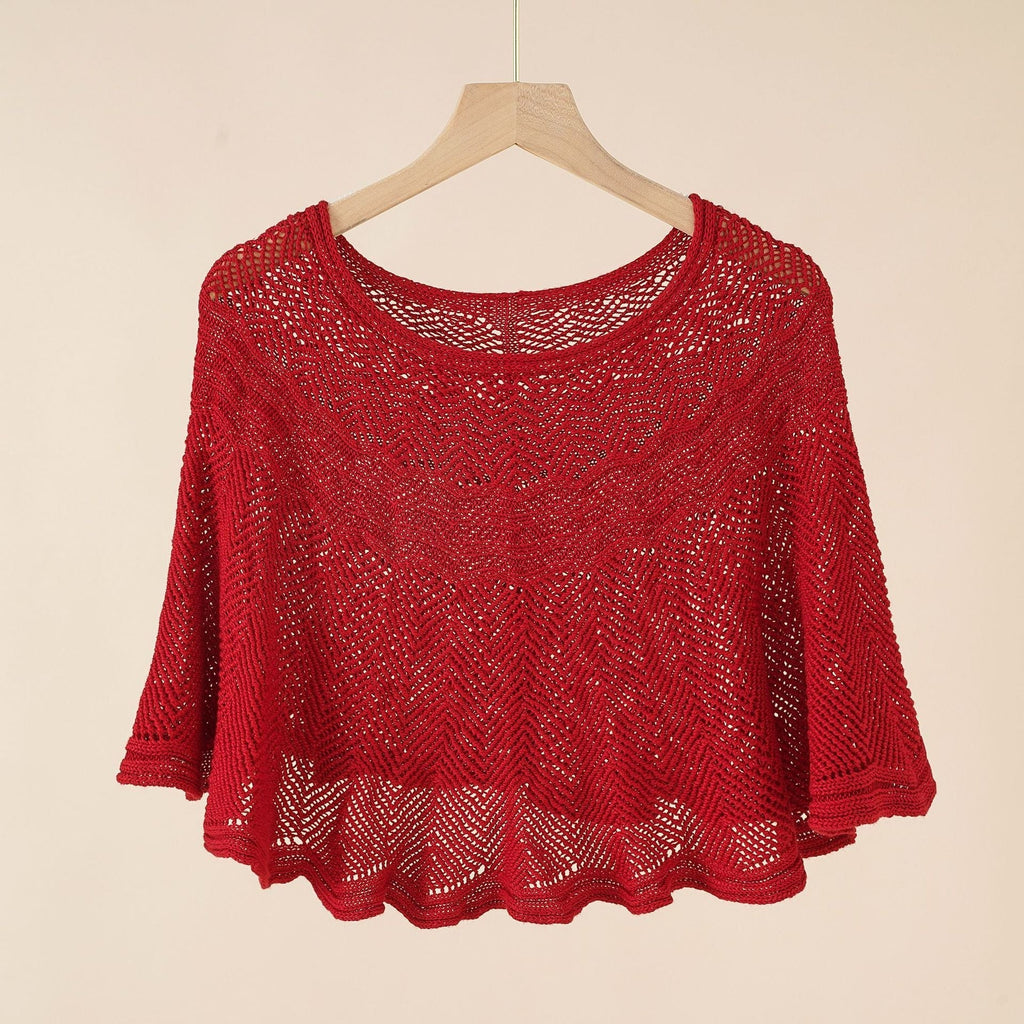 Women's airy knitted poncho in a modern design, size