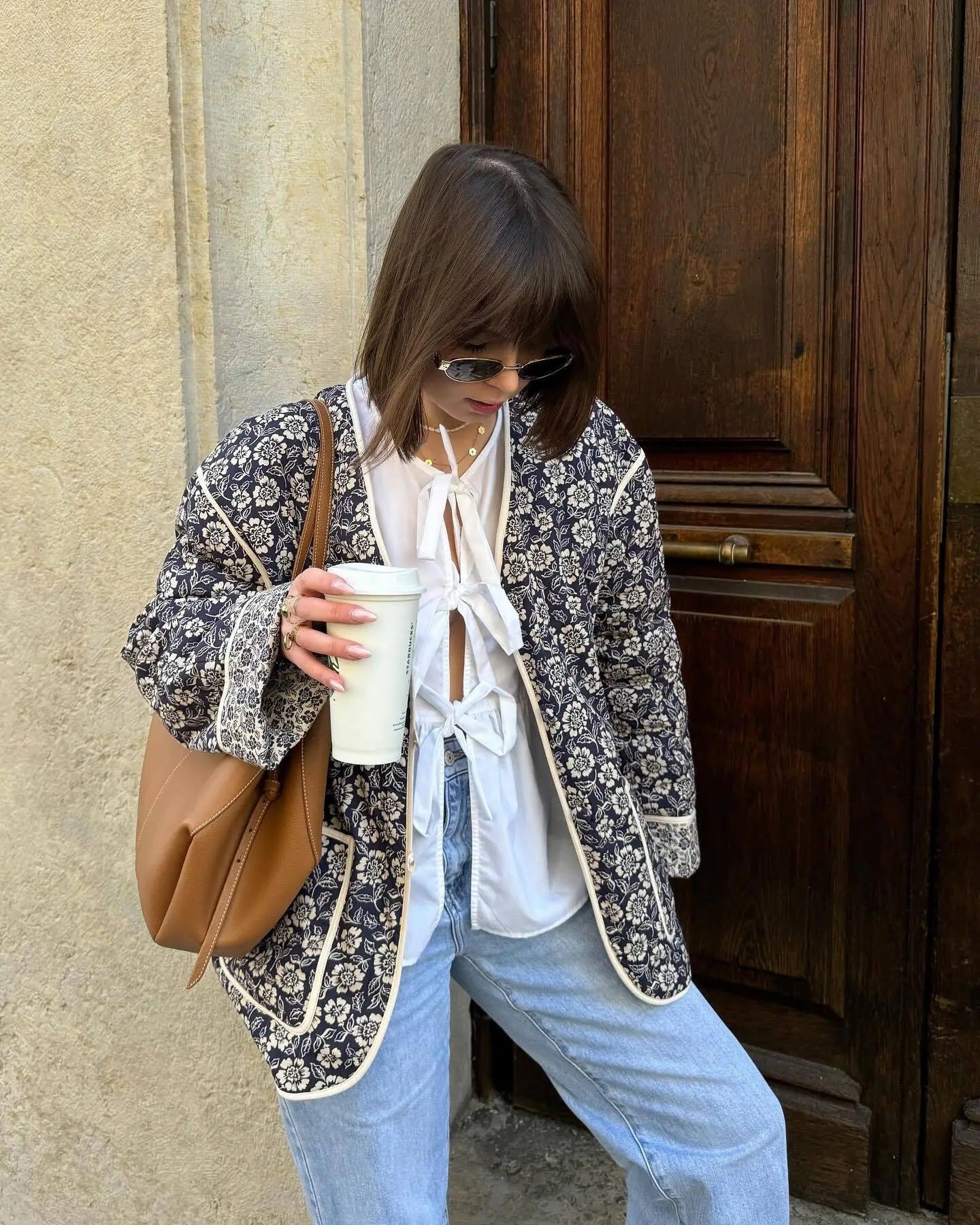 Women's elegant floral jacket in an oversized cut with structured details, size S