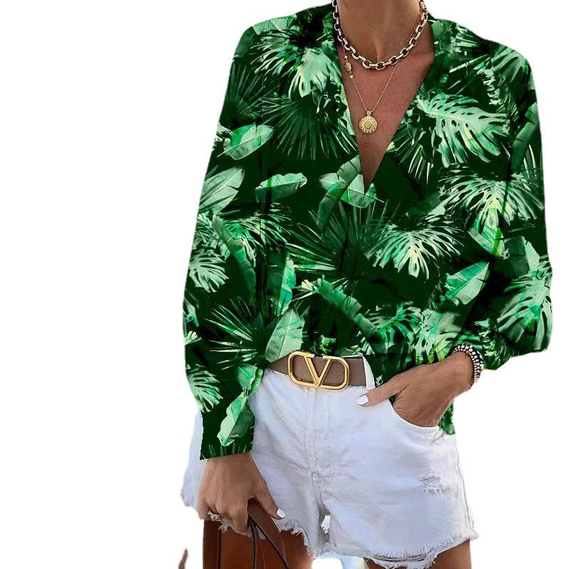 Women's blouse with floral pattern and deep V-neck, size