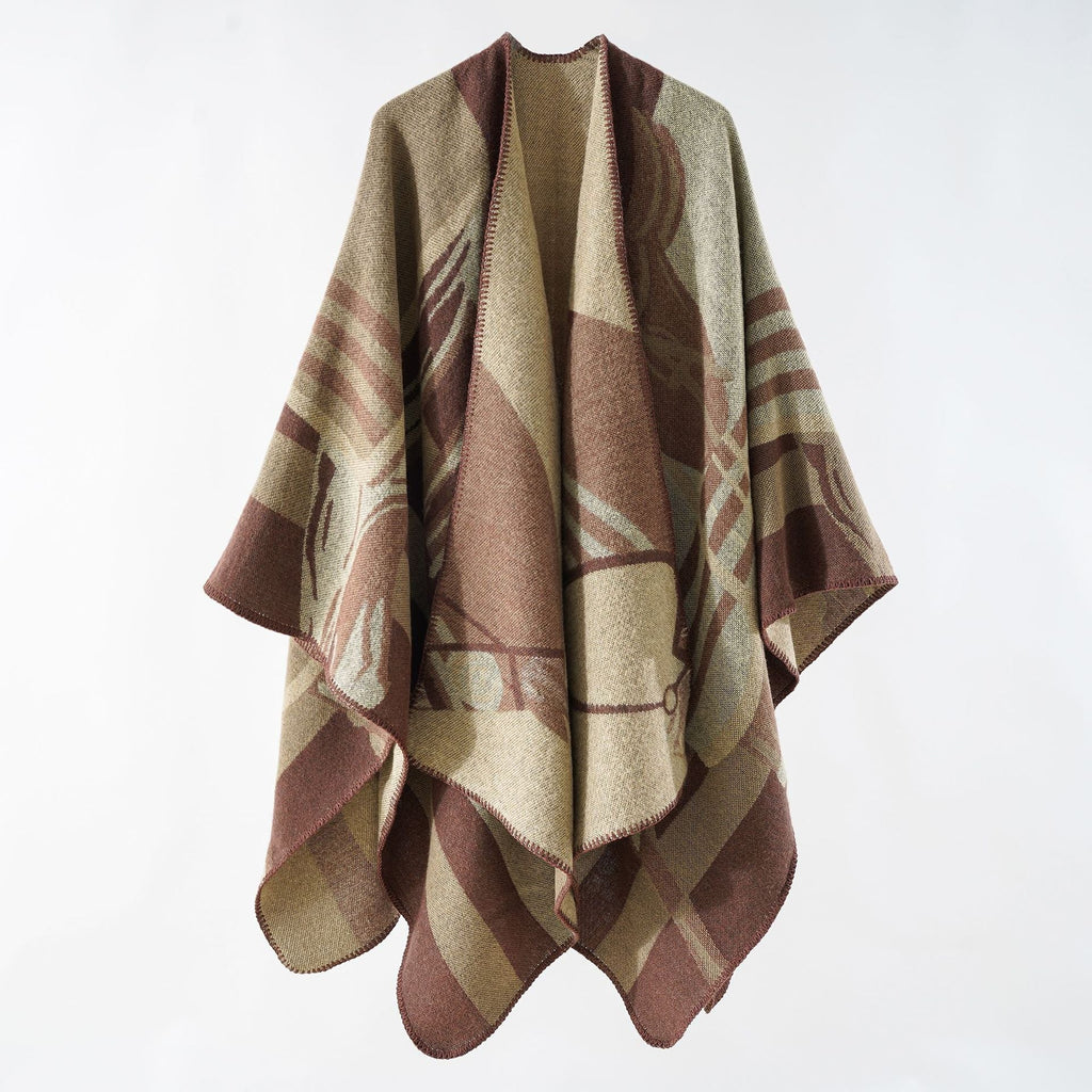 Women's elegant knitted poncho with artistic pattern and fine fringe, size Valenzora