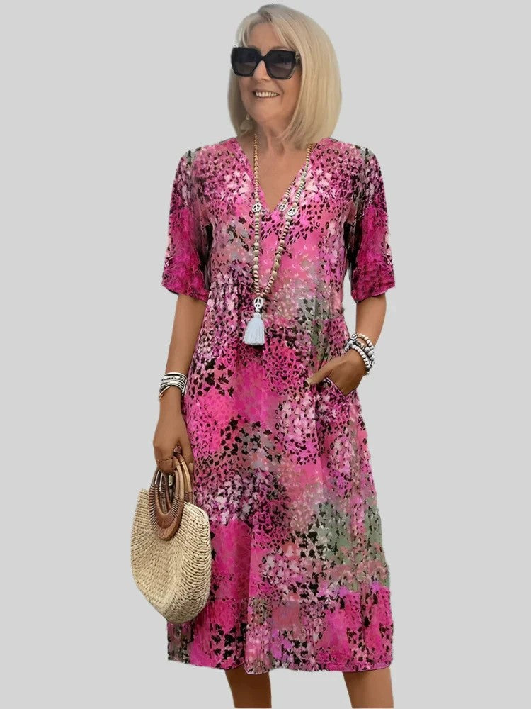 Women's loose summer dress with V-neck and pockets