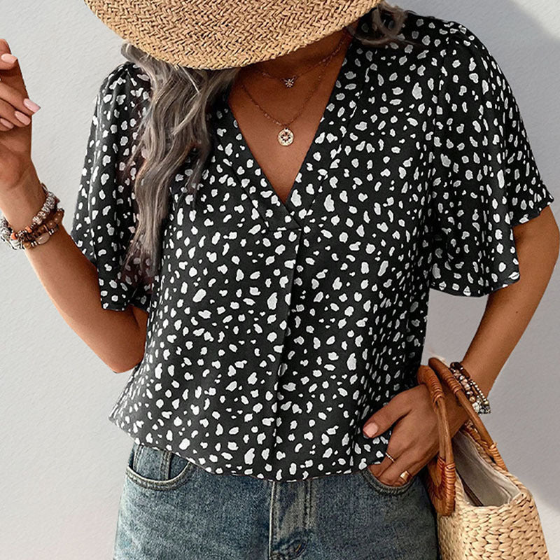 Women's blouse with a relaxed fit and voluminous sleeves, size [size missing]